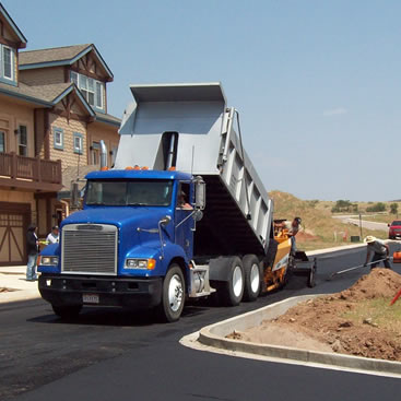 Residential asphalt driveway with clean edges